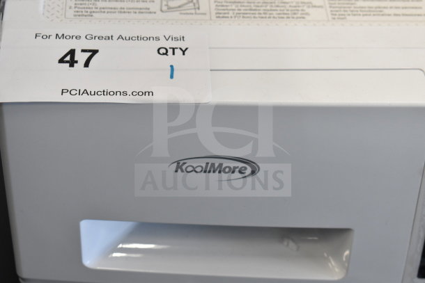 Brand new KoolMore front load washer, scratch and dent condition, visible label indicating auction item number 47.