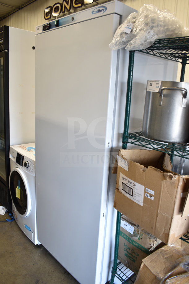 Brand new KoolMore KM-FMD20WH commercial single-door freezer, scratch and dent, 115V, 1 phase, white exterior.