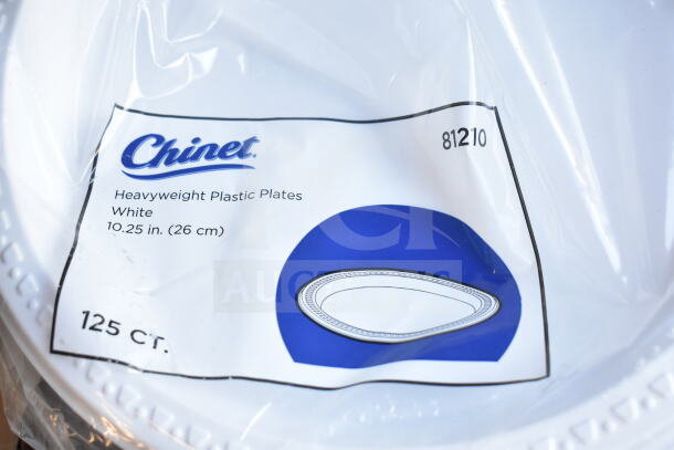 Chinet 10.25" heavyweight plastic plates, 125 count, sealed in packaging. Marked as white and durable.
