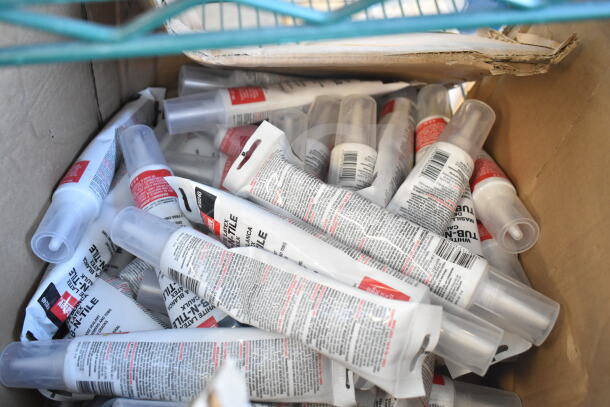 40 Oatey white latex tub-n-tile caulk tubes in box. New condition, clear caps, labeled for bathroom use.