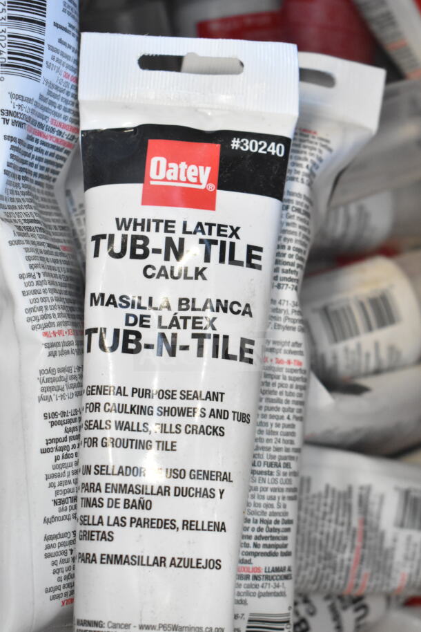 40 Oatey White Latex Tub-N Tile Caulk tubes, general-purpose sealant for showers and tubs; model #30240. New condition.