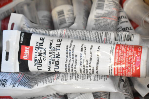 40 Oatey White Latex Tub-N-Tile Caulk tubes, 6 fl. oz each, new in packaging. Ideal for sealing tubs and showers. #30240.