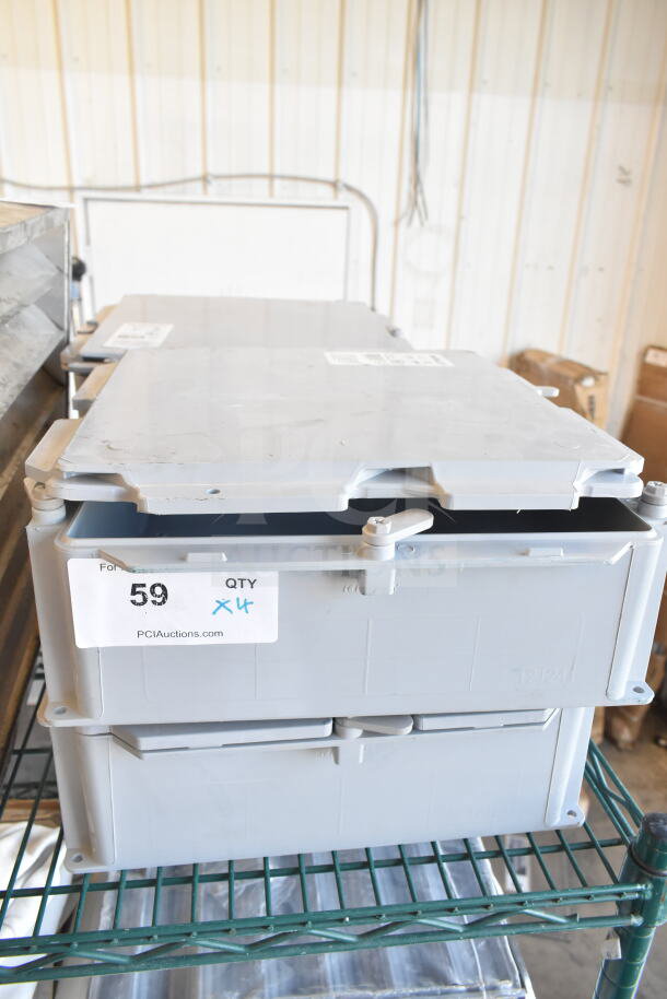4 Kraloy JBX12124 gray poly junction boxes, new, stackable, with label "59 QTY x4". Auction item for durability and outdoor use.