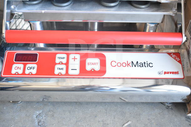 Pavoni Newcookmatic V1 pastry press, 110V, 1-phase, red and silver, with temp/time controls and start button.
