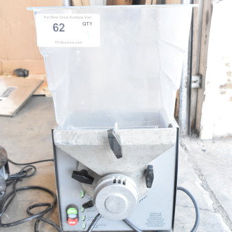 Old Tyme PN2 commercial countertop nut grinder base with hopper mount, 115 volts, 1 phase, used condition, visible power cord.