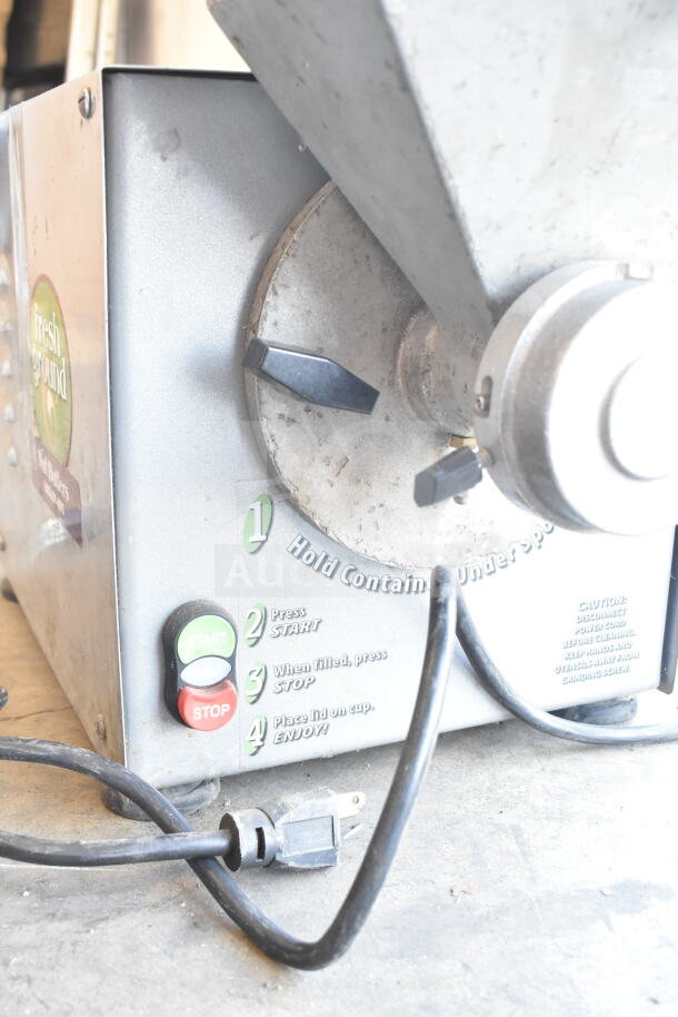 Old Tyme PN2 commercial countertop nut grinder base with hopper mount, 115 volts, 1 phase, visible start/stop buttons.