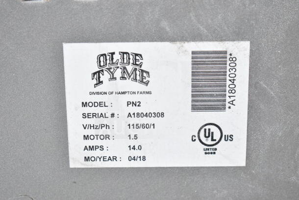 Old Tyme PN2 nut grinder label showing model, serial number A18040308, voltage 115, motor 1.5 HP, and UL listed symbol.