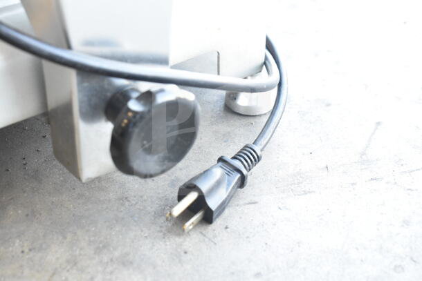 Avantco 177SL309 meat slicer power plug and adjustment knob, showing power requirements of 110-120V, 1 Phase.