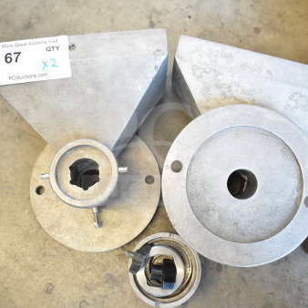 Two front metal pieces for Old Tyme Nut Grinder. Visible wear. Includes a mounting hole. Auction quantity x2.