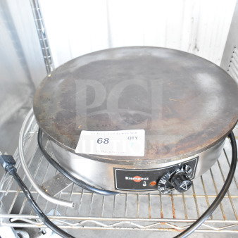 Krampouz countertop crepe maker, 115 volts, 1 phase. Features visible controls and label. Used condition.