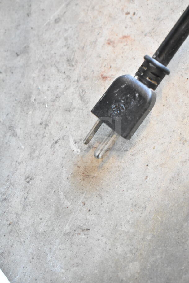 Alt text: Krampouz Countertop Crepe Maker cord on concrete floor, showing standard plug. 115 Volts, 1 Phase, good condition.