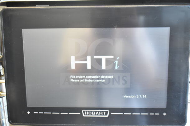 Hobart HTi commercial food portioning scale display with error message, "File system corruption detected." Model HTi, 120/208-240V, 1 phase.