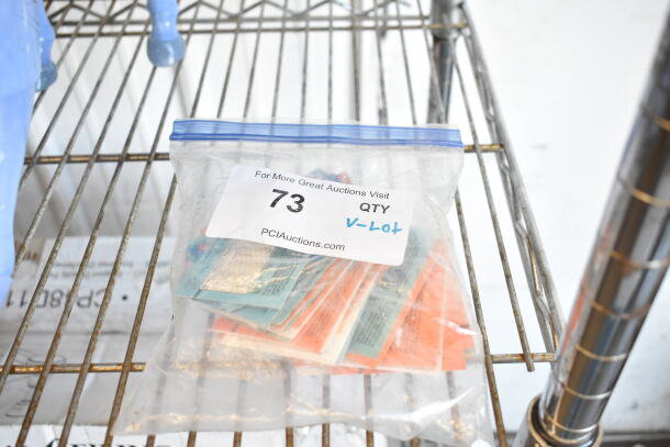 Lot of various baseball cards including Frank DiPino and Mark Portugal, in a clear bag with label "73 QTY V-Lot".