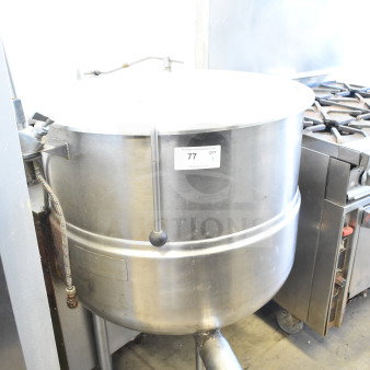 Cleveland KGL-60 60 Gallon Steam Kettle; durable stainless steel, freestanding, visible control valves, auction tag "77".