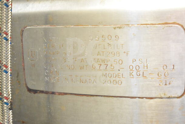 Cleveland KGL-60, 60-gallon steam kettle label. Serial 6775-00H-01, MAWP 50 PSI at 298°F. Certified by Welbilt, made in Canada.