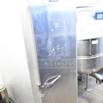 Traulsen G10010 commercial single door reach-in cooler, 115 volts, 1 phase. Visible wear, stainless steel, single door handle.