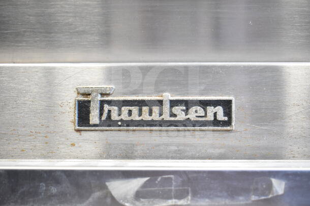 Traulsen G10010 Commercial Single Door Reach-In Cooler, stainless steel exterior with logo plaque. 115 Volts, 1 Phase.