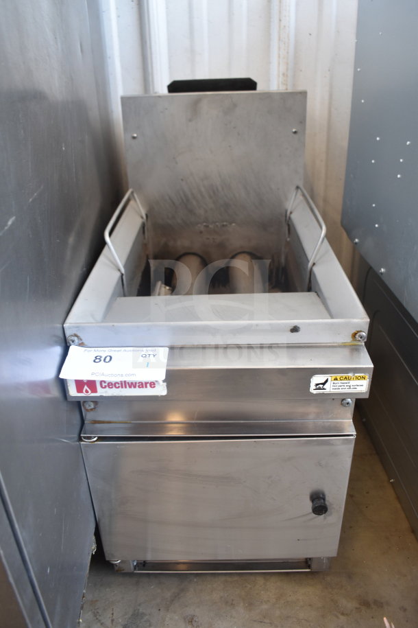 Cecilware Countertop Deep Fat Fryer in stainless steel. Features a front tap and caution label. Appears in good condition.