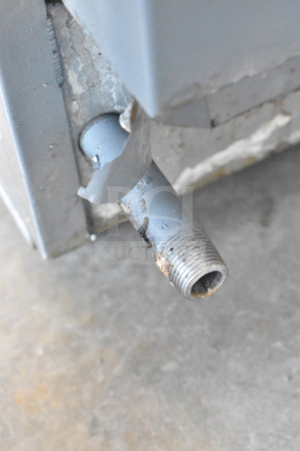 Cecilware countertop deep fat fryer with visible wear and rust on the drain pipe, indicating used condition.