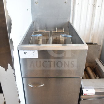 Pitco Frialator natural gas deep fat fryer, floor style, 107,000 BTU, with dual fryer baskets, used condition, auction label visible.