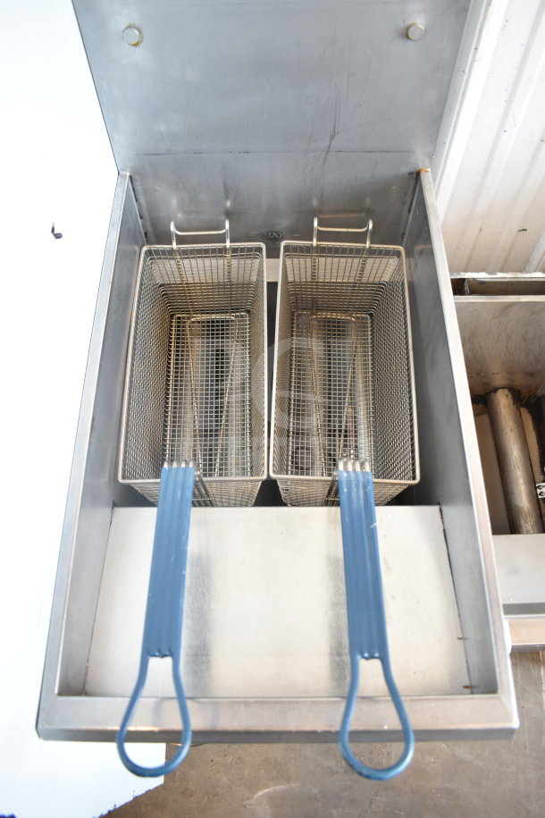 Pitco Frialator floor style natural gas deep fat fryer with two baskets, 107,000 BTU, stainless steel, good condition.