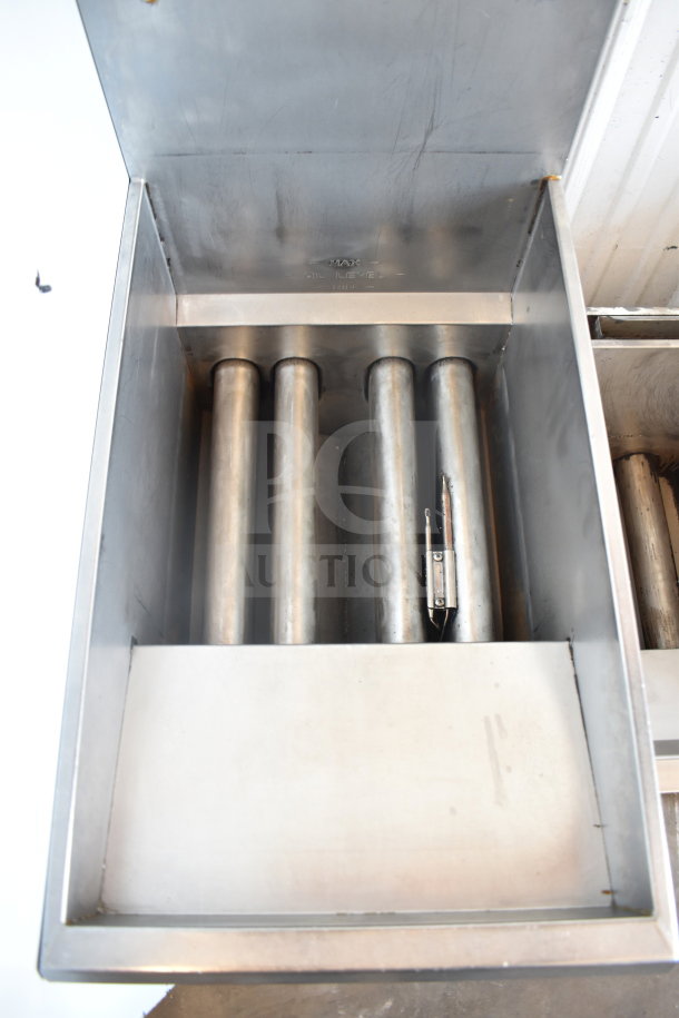 Pitco Frialator floor-style natural gas deep fat fryer, 107,000 BTU capacity, stainless steel, clean condition, with oil level markings.