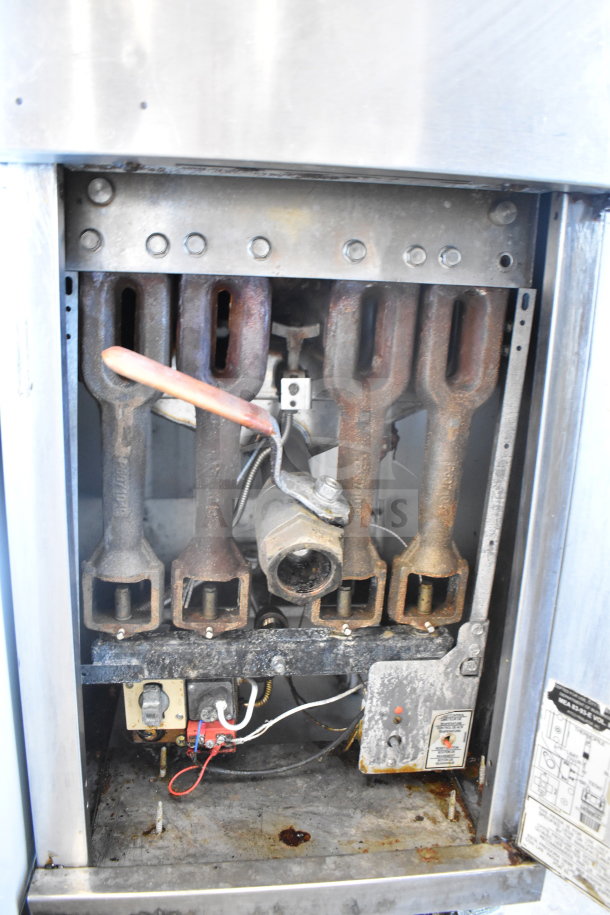 Pitco Frialator deep fat fryer, natural gas powered, 107,000 BTU, showing internal burners. Used condition.