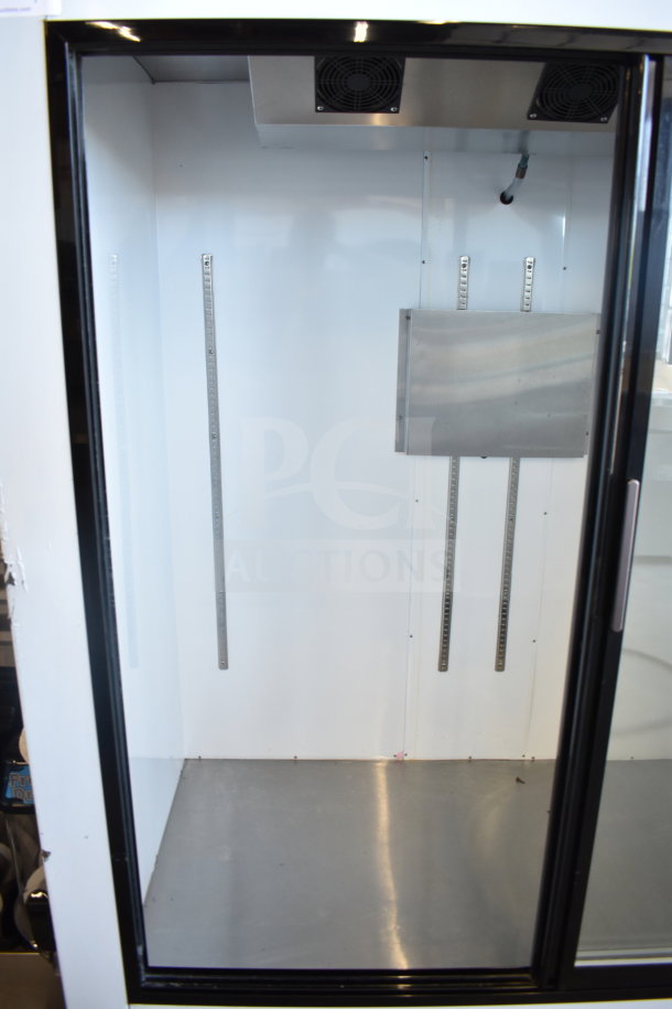 Optimum SG-54 commercial 2-door reach-in cooler, 120V, 1 phase, sleek black frame, excellent condition interior.
