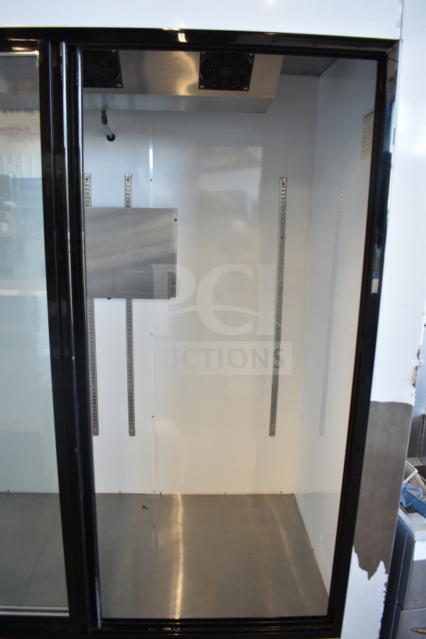 Optimum SG-54 commercial 2-door cooler merchandiser, 120 volts, 1 phase, interior view.