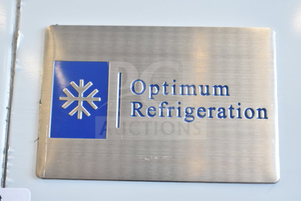 Optimum SG-54 commercial 2-door cooler; 120V, 1 Phase. Features stainless label with snowflake logo and brand name.