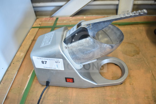 Zeny Countertop Ice Crusher, 110-120V, 1 Phase. Metallic finish, visible power switch, good condition, auction label 87.