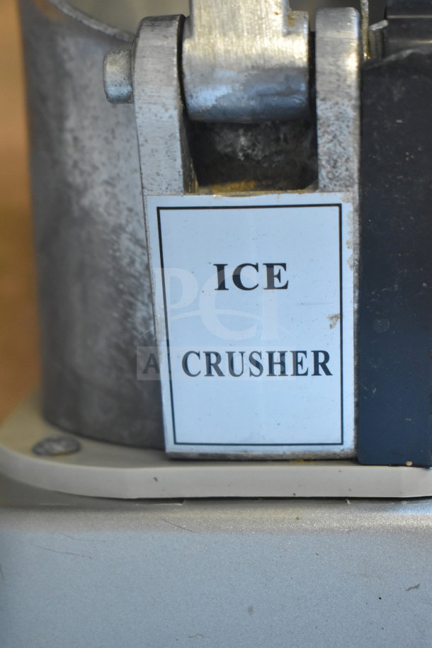 Zeny Countertop Ice Crusher, metal construction, label reads "Ice Crusher," 110-120 Volts, 1 Phase, some wear.