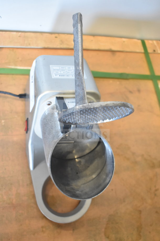 Zeny Countertop Ice Crusher, 110-120 Volts, 1 Phase. Features heavy-duty metal design, operational handle, good condition.