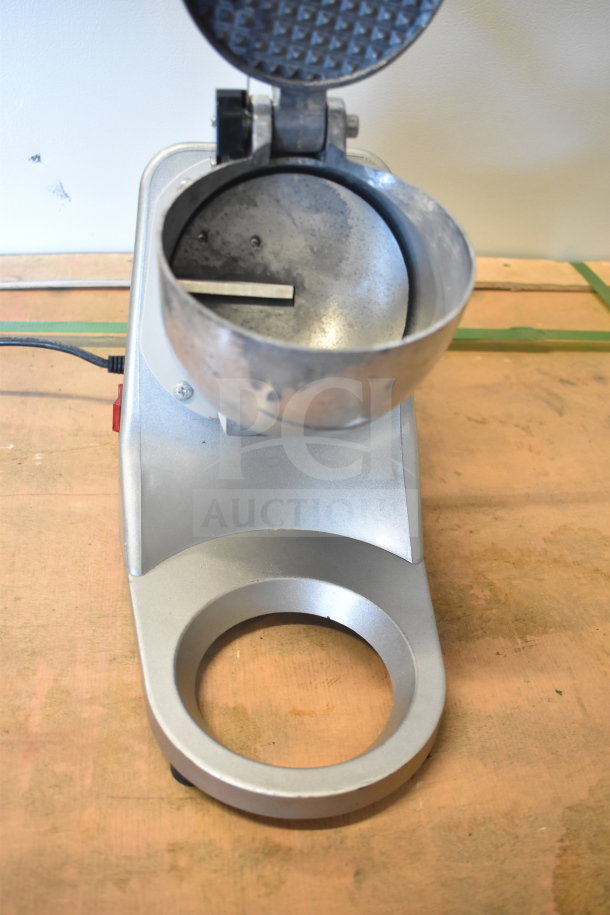 Zeny Countertop Ice Crusher, 110-120 Volts, 1 Phase, showing open crushing chamber, silver finish, good condition.