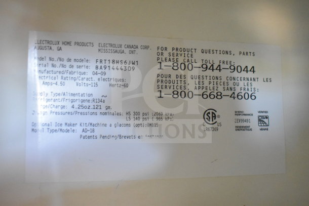 Label of Frigidaire FRT18HS6JW1 Reach In Cooler with Freezer. Shows specs: 115 Volts, 1 Phase, model and contact info.