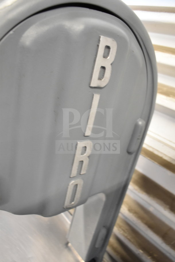 Biro 22 Commercial Meat Saw, gray, with prominent brand lettering. Robust floor style, suitable for high-volume use.
