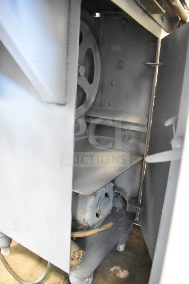 Biro 22 Commercial Floor Style Meat Saw, used condition, visible internal components, sturdy metal frame, some rust.