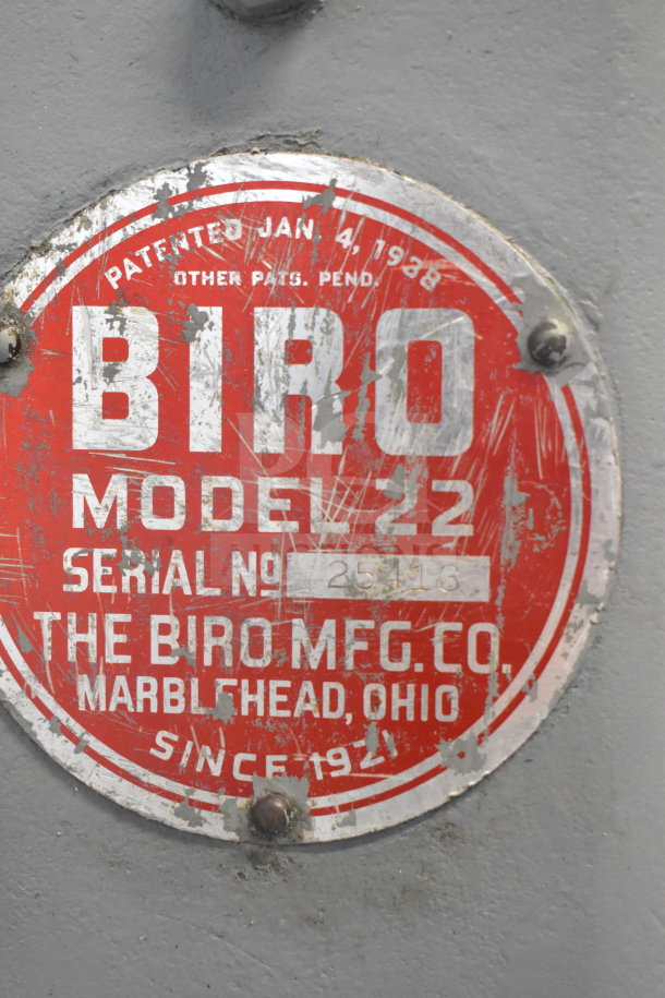 Biro 22 commercial floor meat saw, red and white label with model and serial number, used condition.

