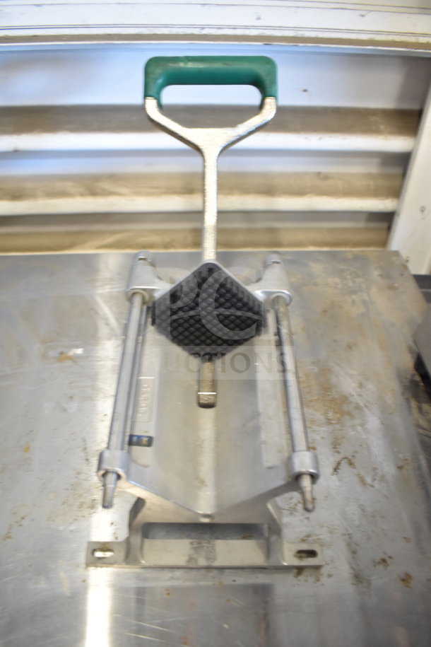 Garde Countertop French Fry Cutter with green handle, sturdy metal frame, lightly worn condition.