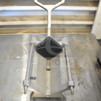 Garde Countertop French Fry Cutter with green handle, sturdy metal frame, lightly worn condition.