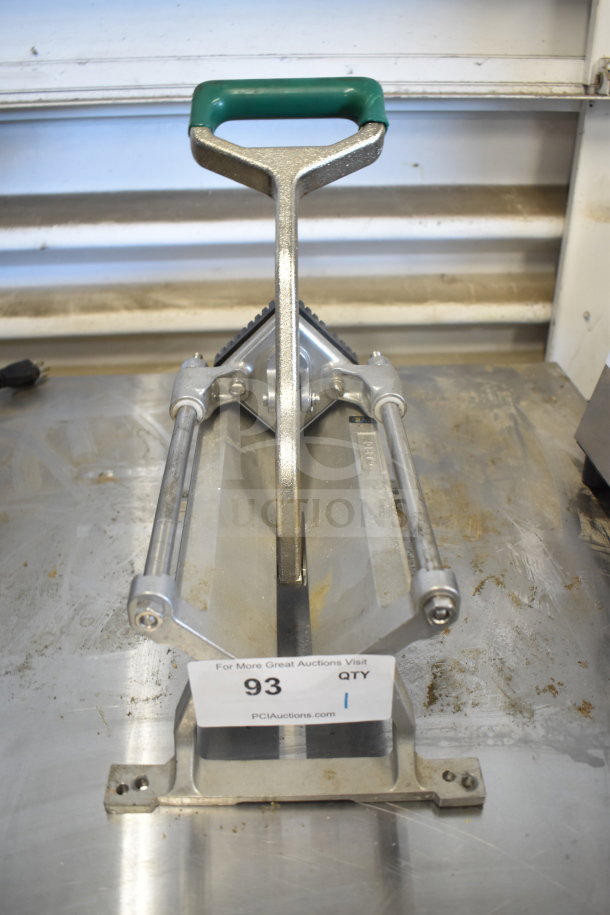 Garde countertop French fry cutter with a green handle, metal frame, and bench mount holes; item tag with number 93 visible.