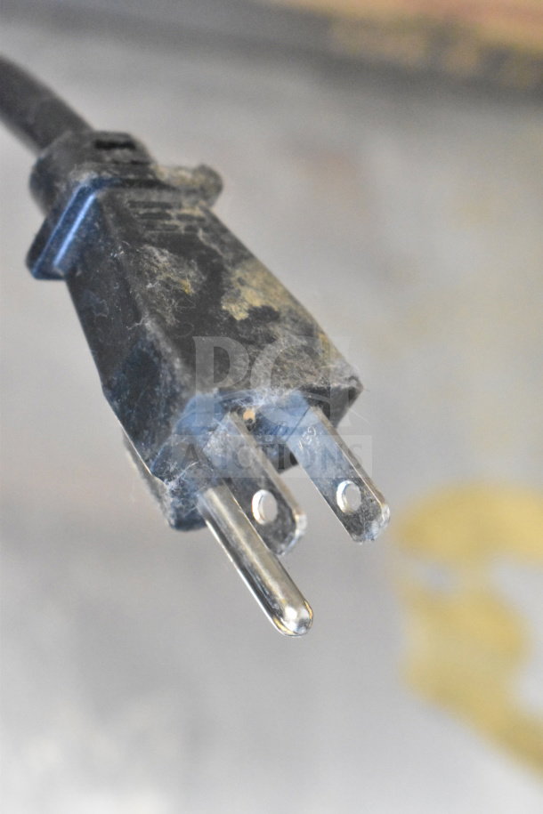 Frayed power cord of Hamilton Beach HMD400 drink mixer, showing wear. 120V, 1 Phase. Potential for repair or parts use.