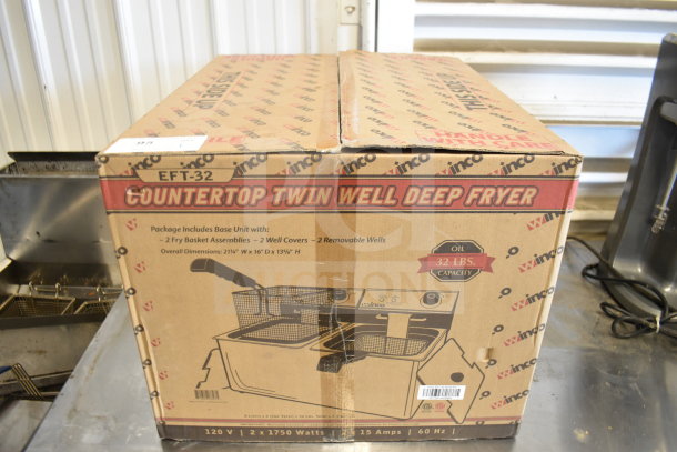 Boxed Winco EFT-32 electric countertop fryer, 2 bays, 2 lids, brand new scratch and dent, 32 lbs oil capacity.