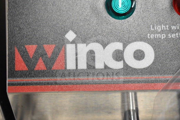 BRAND NEW Winco EFT-32 countertop electric fryer, two bays, two lids. Visible control panel with brand logo and indicator lights.