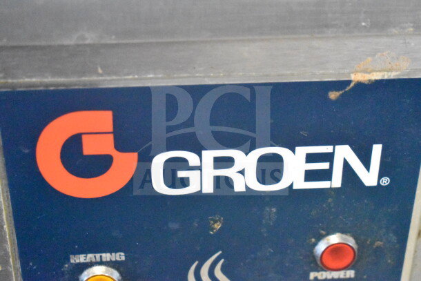Groen T/1-40 commercial steam kettle control panel showing heating and power buttons, slight wear visible.