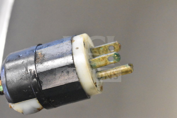 Propane gas plug for Groen T/1-40 steam kettle, showing wear and corrosion on prongs.