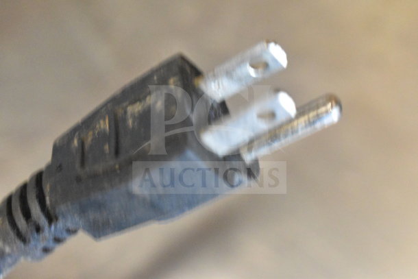 Close-up of a power plug for the Maxx Cold MXSF60UHC commercial freezer, 115 volts, 1 phase.