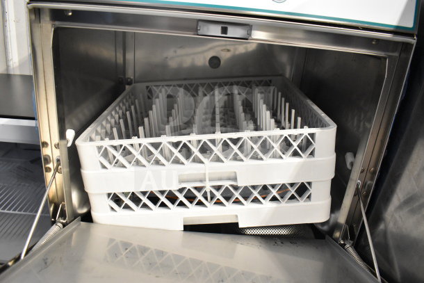 Brand new Noble 495LTUC24 low-temp undercounter dishwasher, 120V, 1 Phase, shows pristine interior and dish racks.
