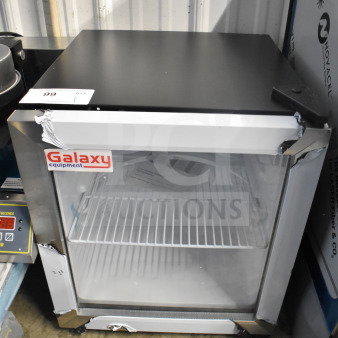 Brand new Galaxy 177CRG2B mini cooler merchandiser, scratch and dent, 110-120V, 1 Phase, with visible Galaxy label.