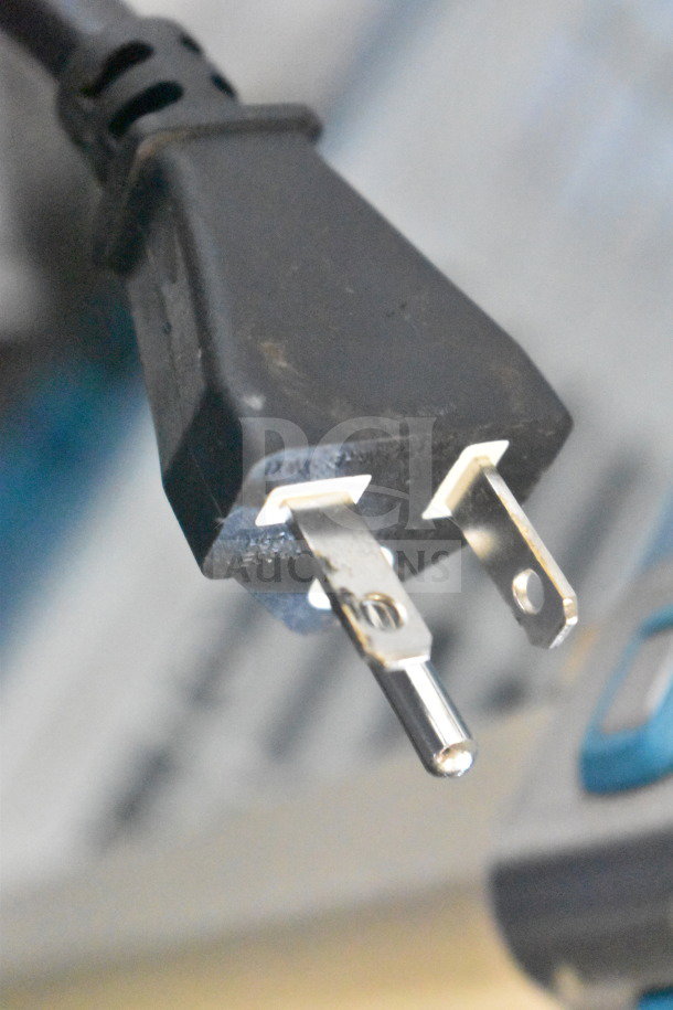 Electrical plug close-up of Avantco 177IWC35 wok induction range, showing power requirements for 208-240 volts, 1 phase.